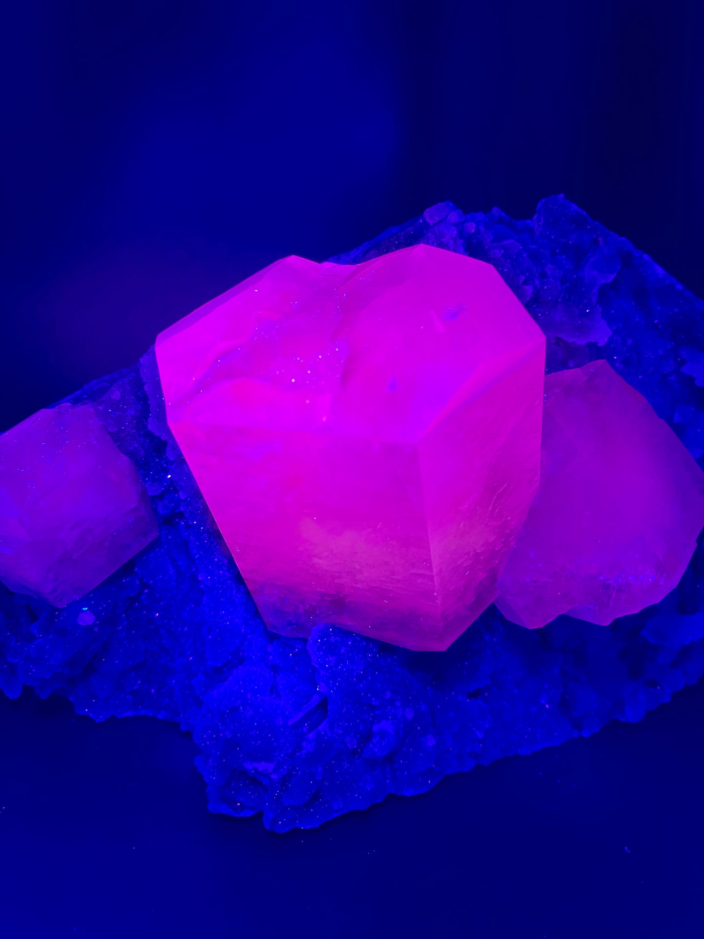 Highly UV Calcites on Black Druzy Quartz Matrix