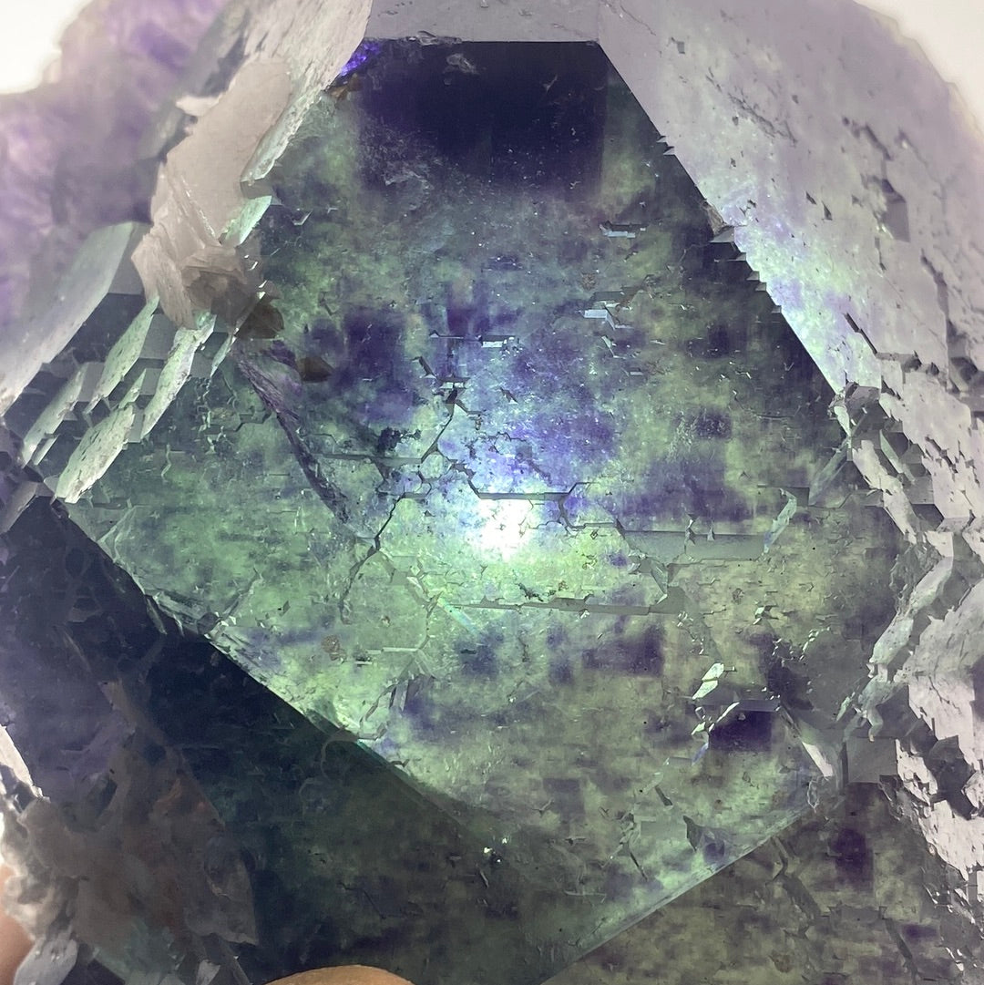 Floating Green/Purple Fluorite. Great zoning and complex etchings.
